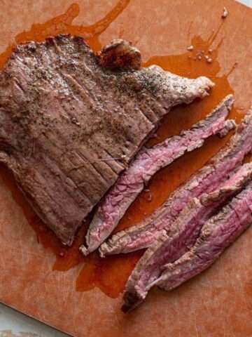 air fryer flank steak on cutting board
