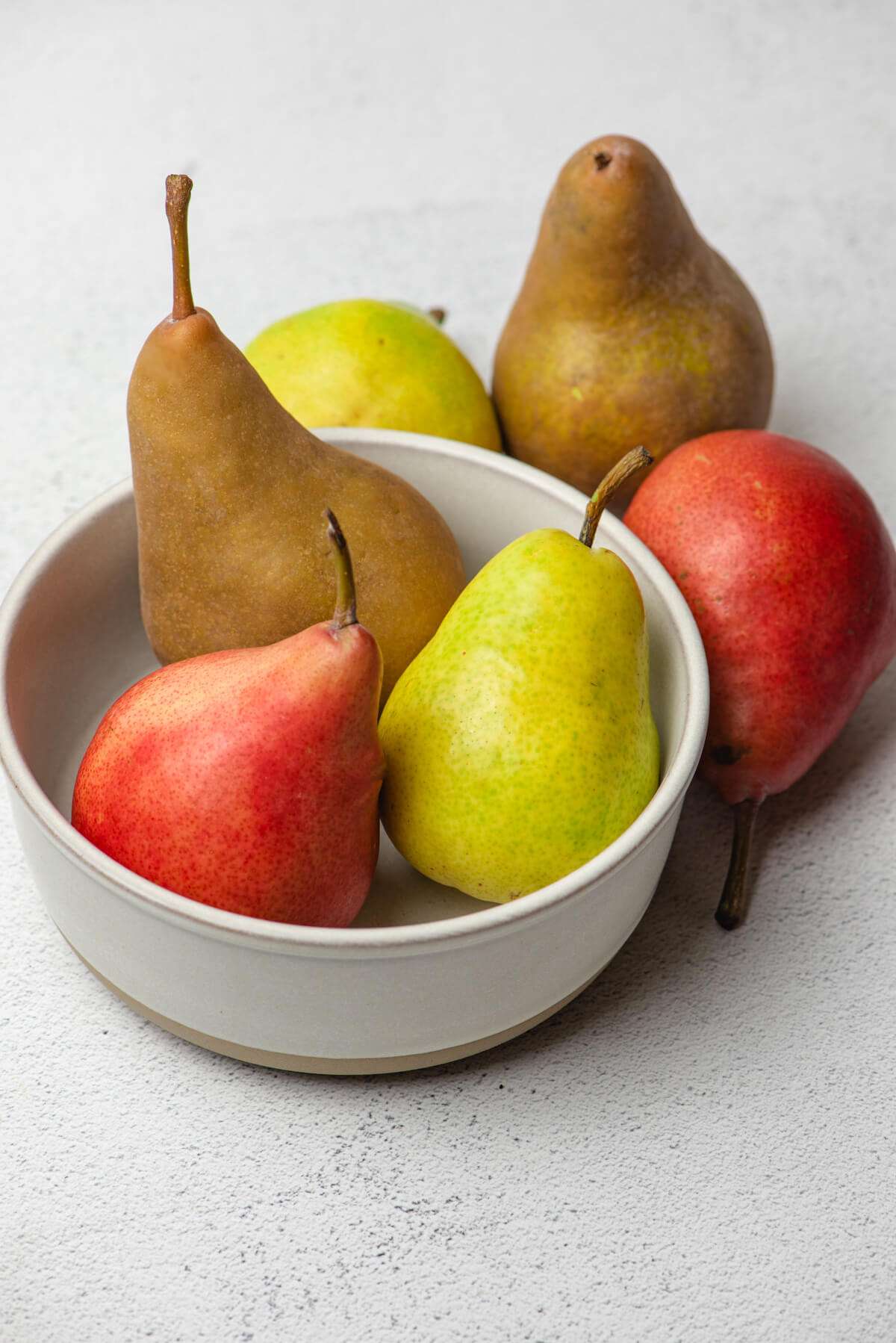 bowl of Bosc, Bartlett, and Anjou pears