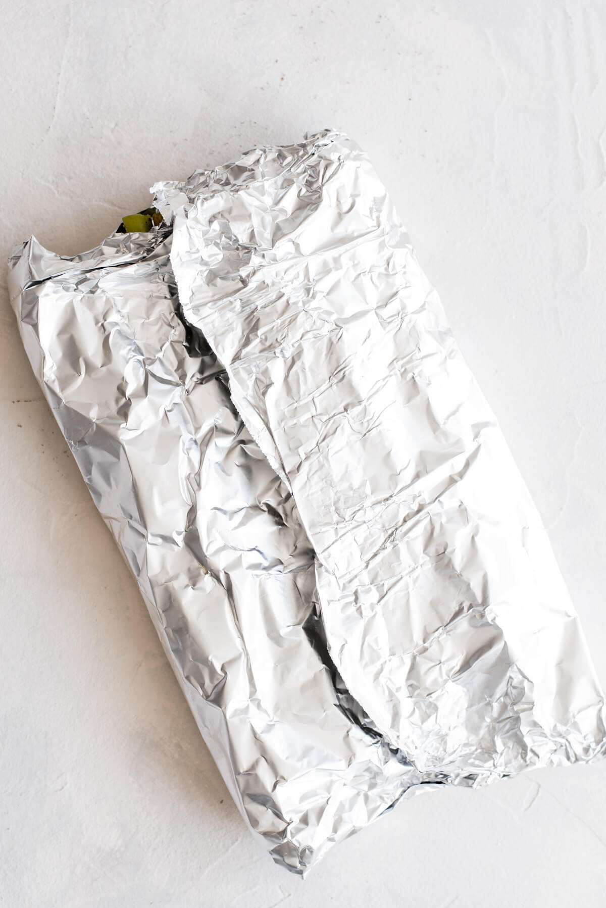 asparagus sealed in aluminum foil packet